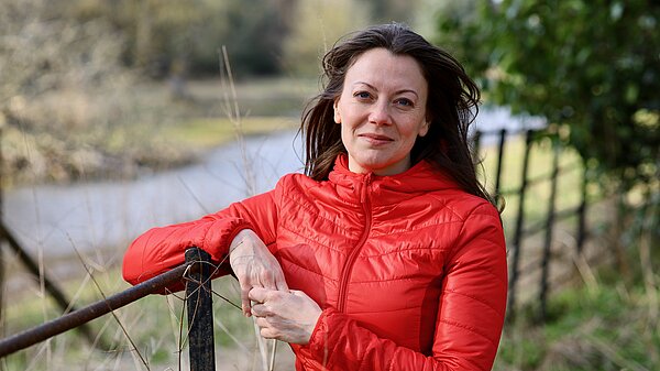 Sarah Green MP standing next to the River Misbourne